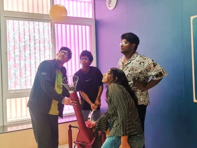 IIFA Multimedia students trying an interactive science exhibit, Bengaluru