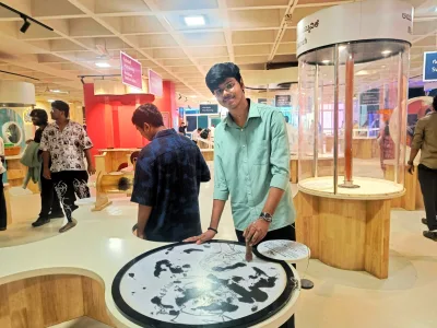 IIFA students studying a science and technology display on the 2026 museum study trip
